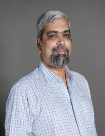 Dr. Shamuel Tharu